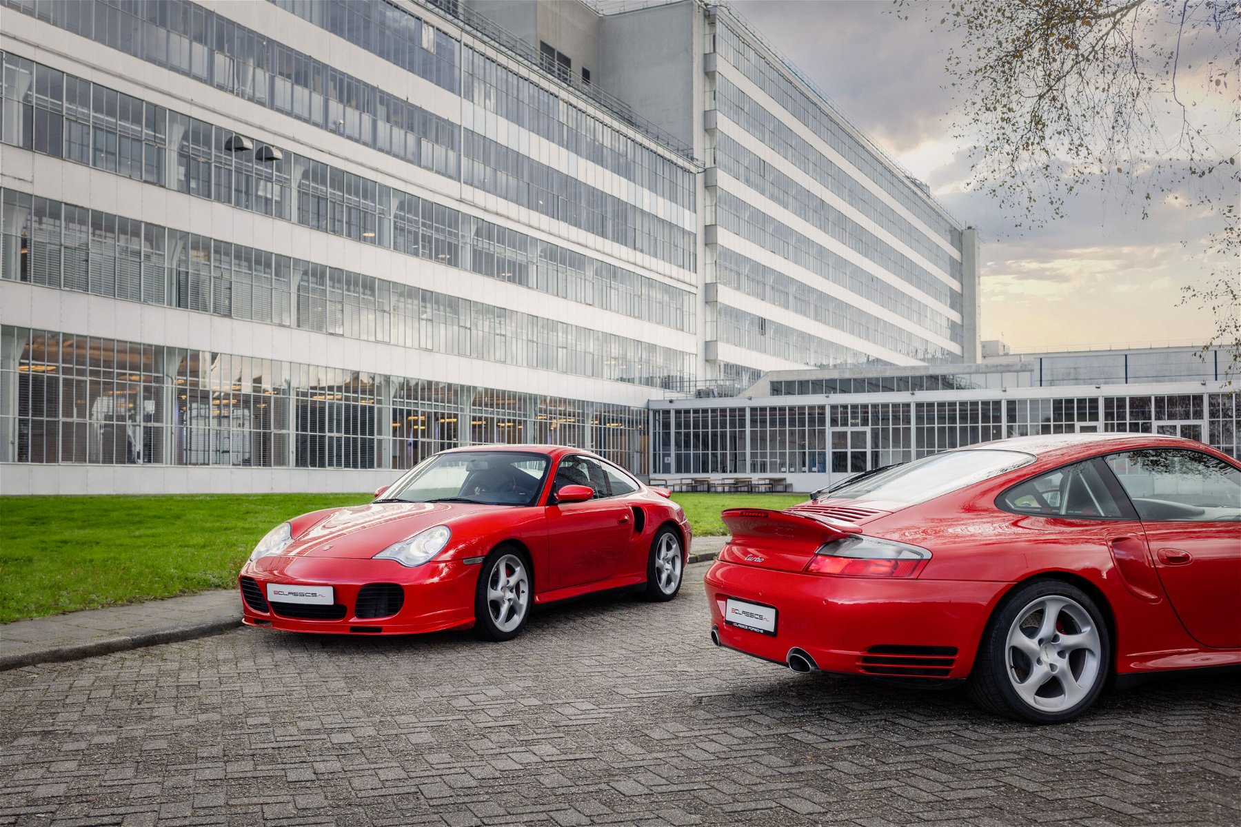 Two Porsche 996 Turbo in guards red