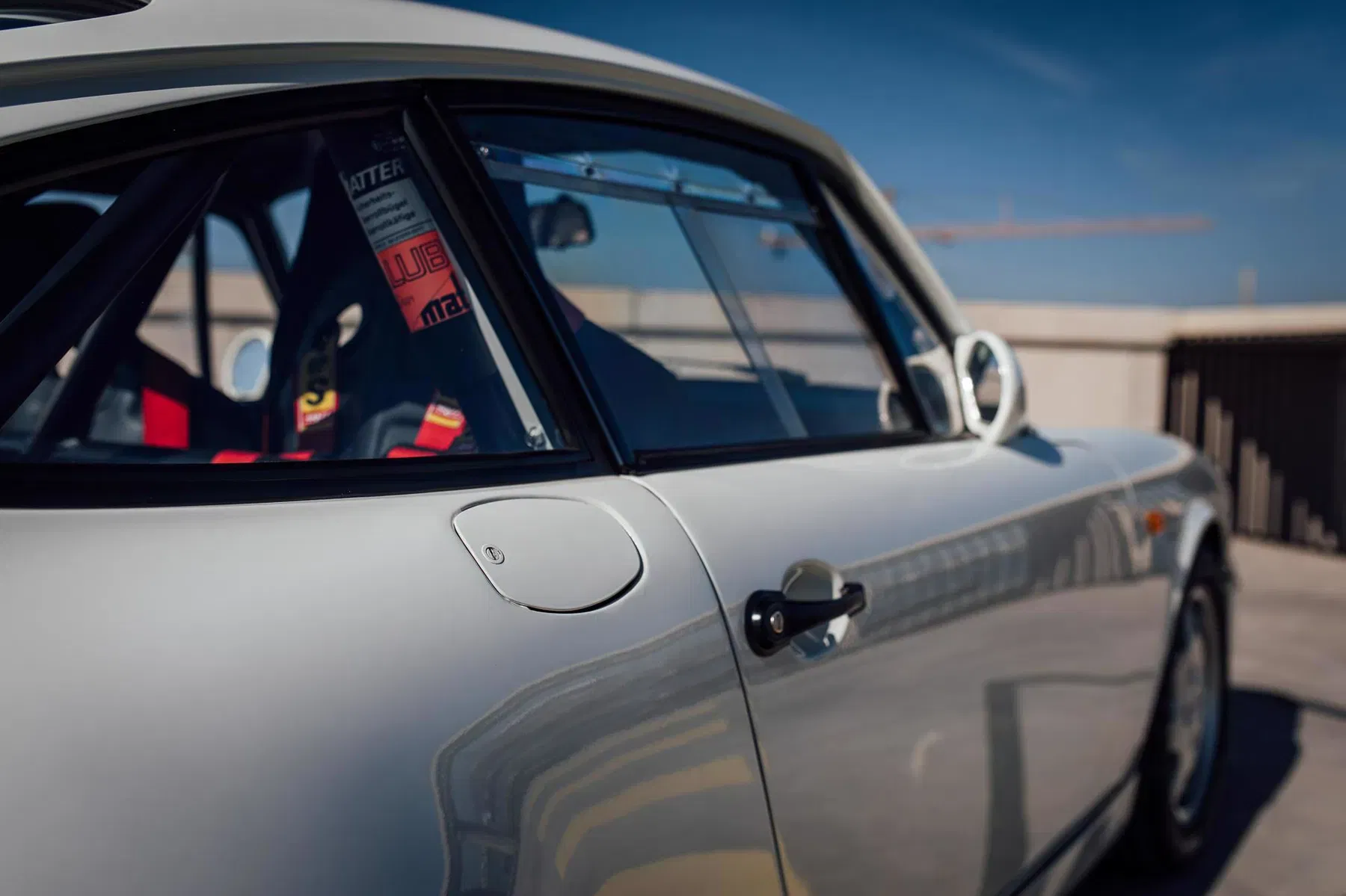 Porsche 964 Carrera 4 Leichtbau
Porsche 964 Carrera 4 Lightweight
Oil flap
Ölklappe