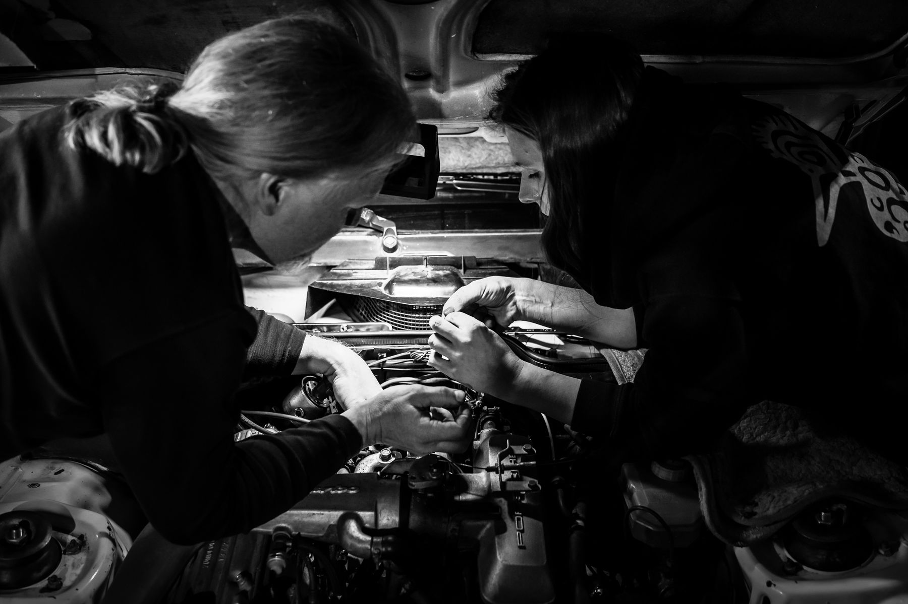 Birte Krause working on her Porsche 924 Turbo engine