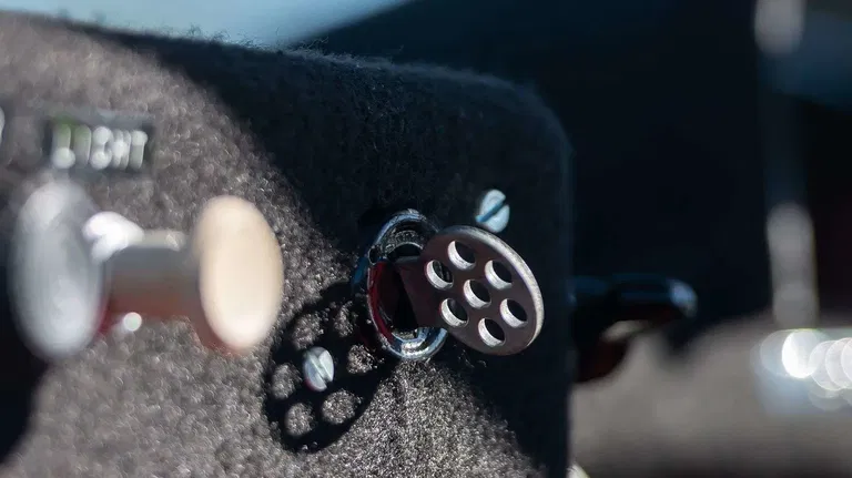 Why do Porsches have the key on the left?